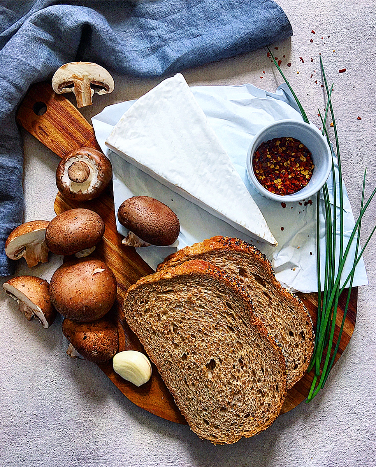 Upgrade your toast game with slices of grilled Brie and garlicky mushrooms!