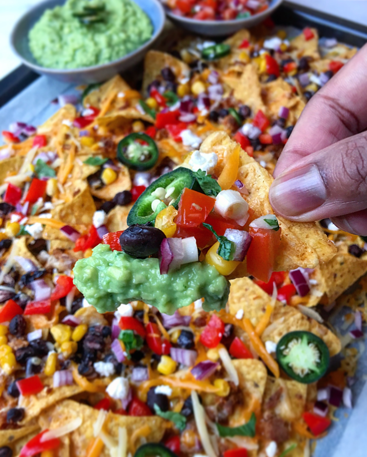Melty nachos goodness with a twist! Use your canned goods for an easy and inexpensive snack!