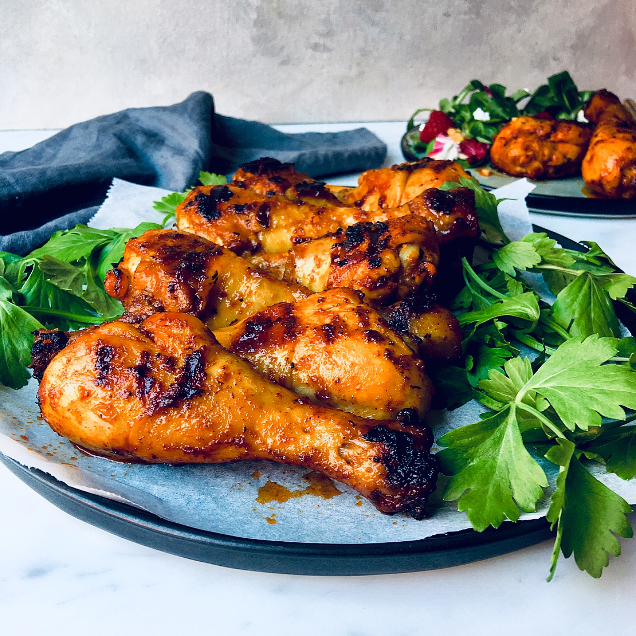 These baked drumsticks are marinated in a thick sauce and then baked until golden.